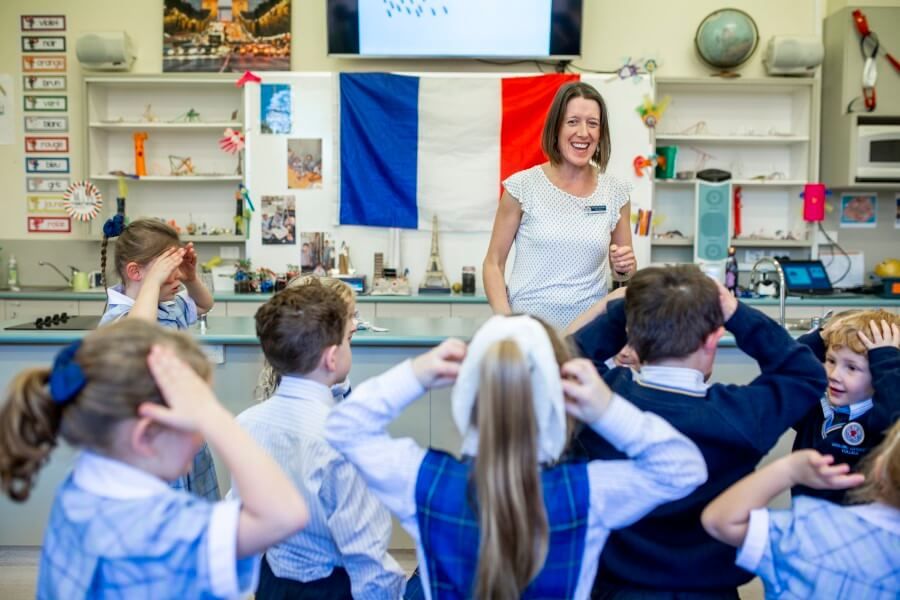 Teacher with students